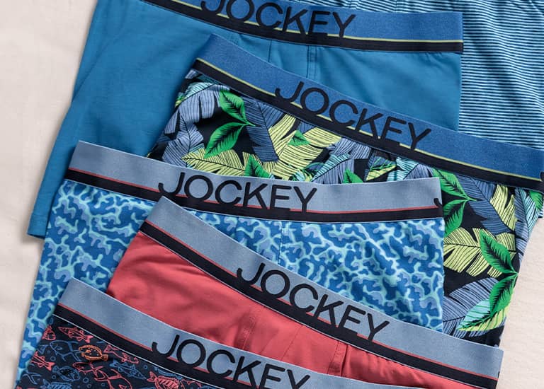 pairs of Jockey underwear laid out on the floor