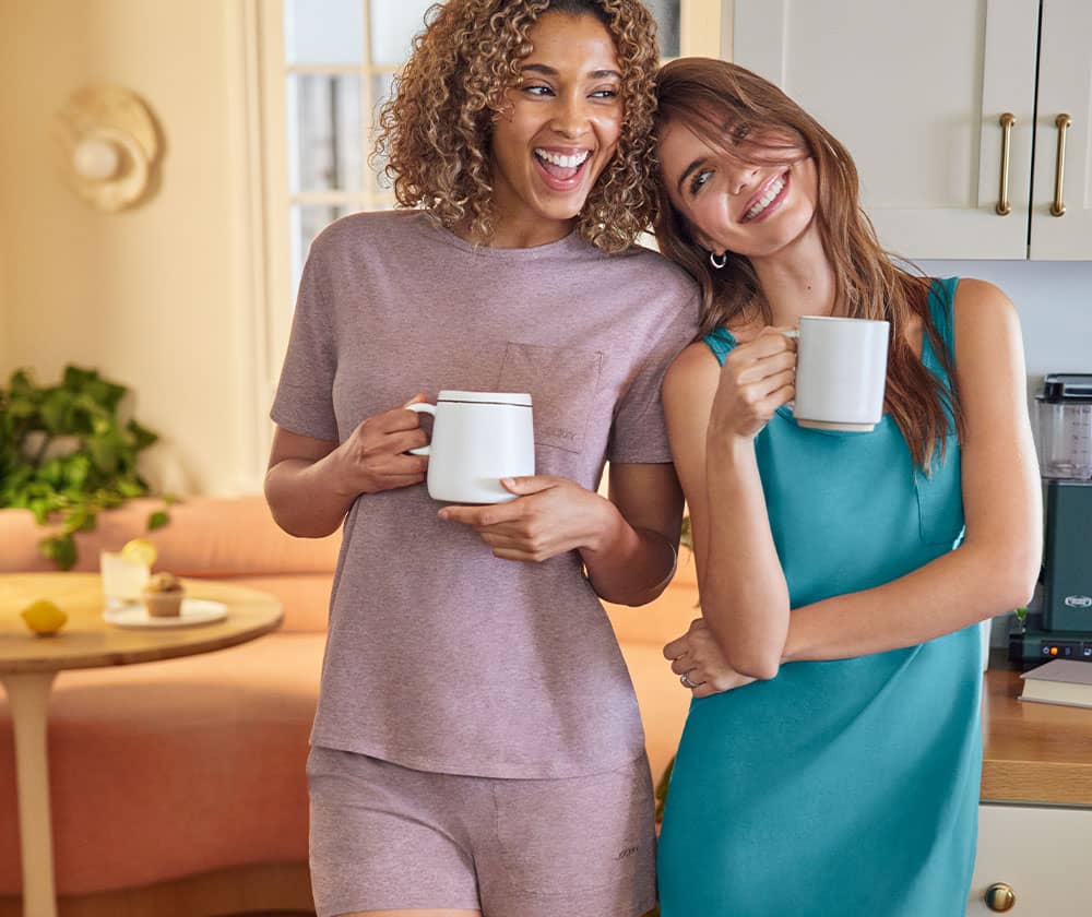 woman drinking coffee and wearing loungewear