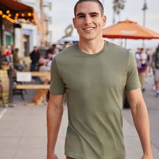Man in green tshirt outside