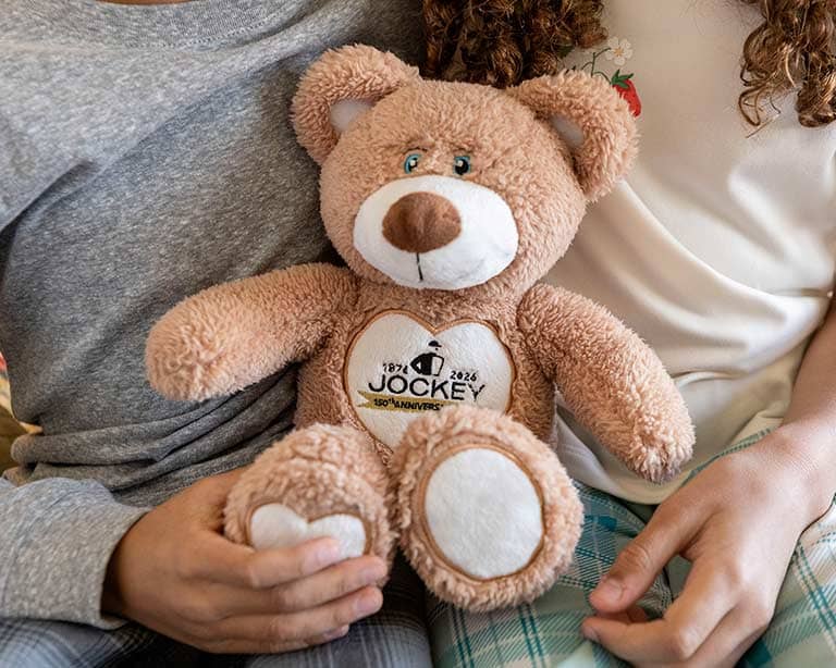 Limited edition Jockey Being Family Anniversary Bear being held