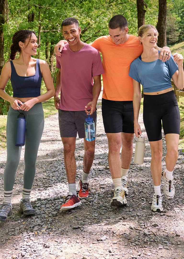 Group of friends wearing EverActive™ Collection apparel on a hike