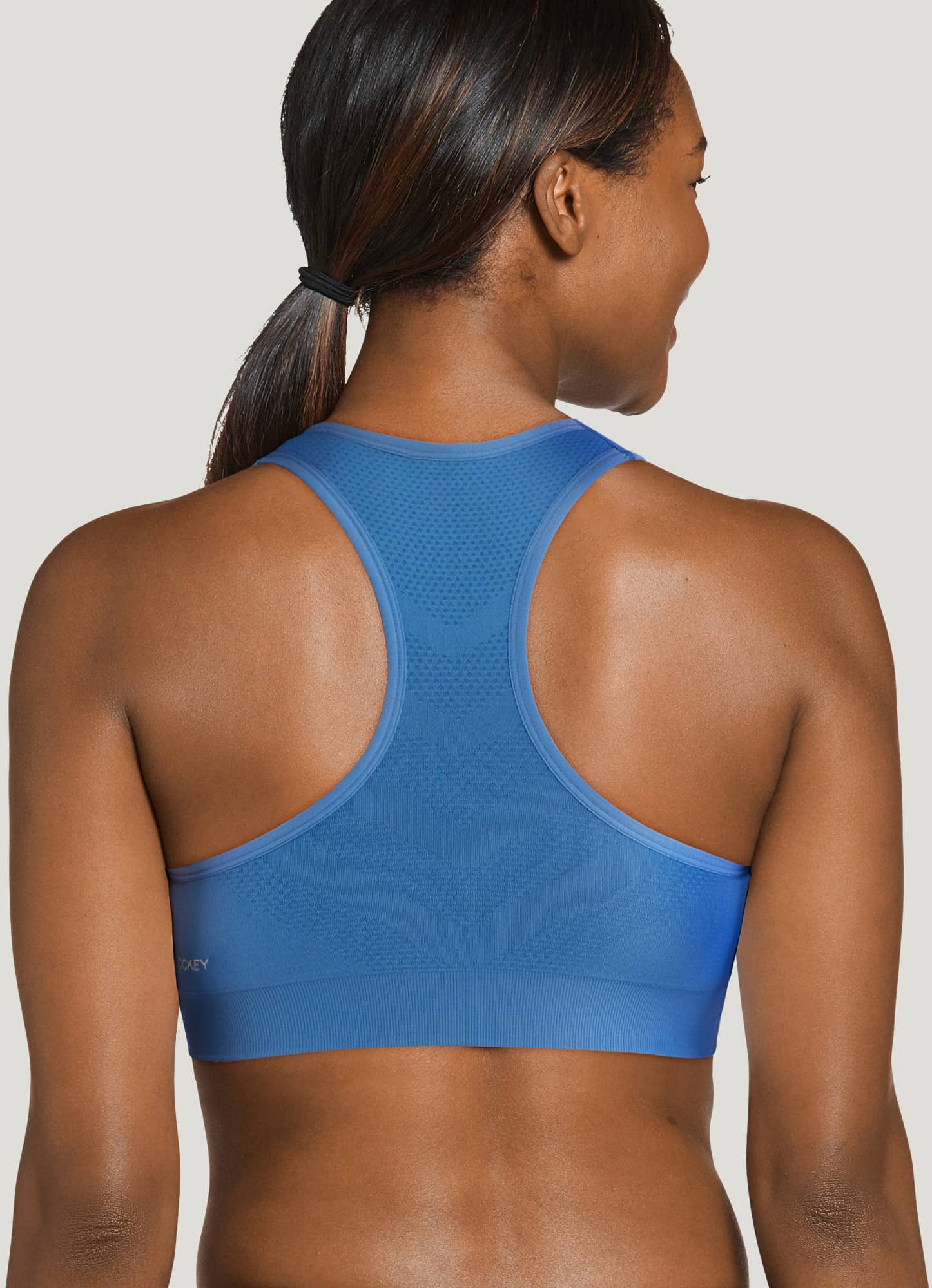 Buy Women Mid Impact Zip Sports Bra with Removable Pads online